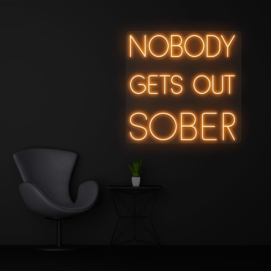 NOBODY GETS OUT SOBER orange color