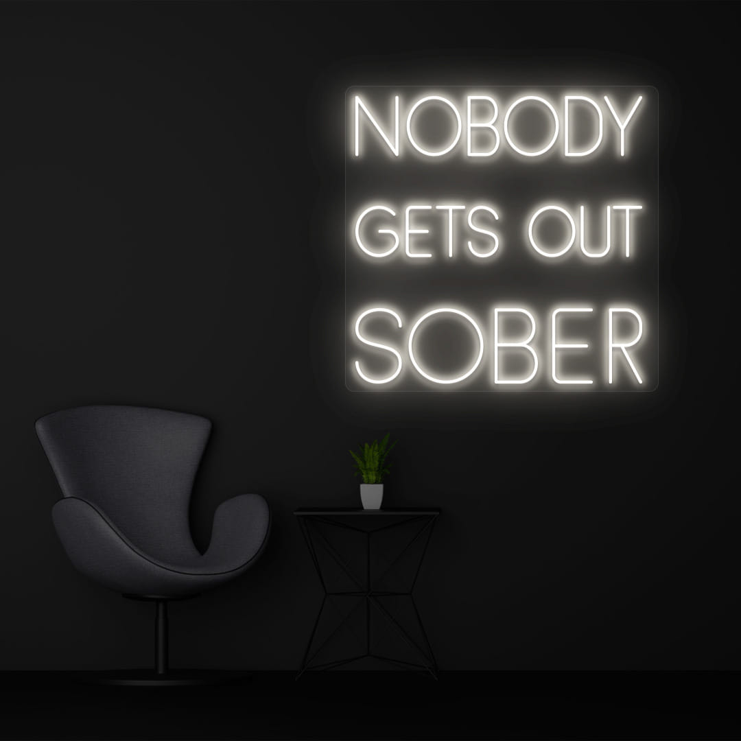 NOBODY GETS OUT SOBER warm white color